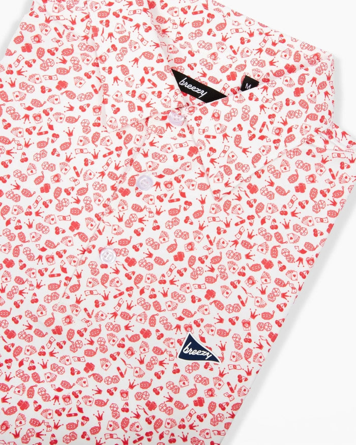 Flat lay of Breezy Golf Vegas Baby Polo highlighting collar and button placket detail.