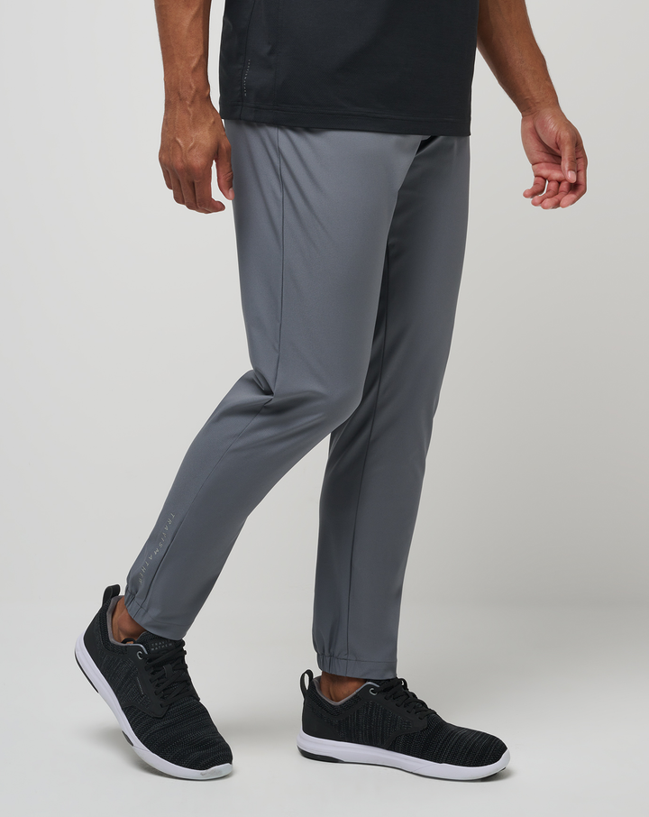 Side view of the Open to Close Jogger in grey with a modern tapered silhouette.
