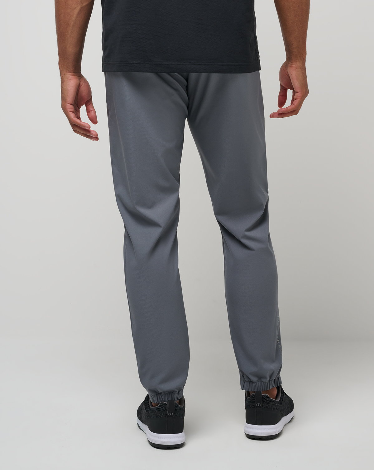 Back view of the Open to Close Jogger in grey with a modern tapered silhouette.
