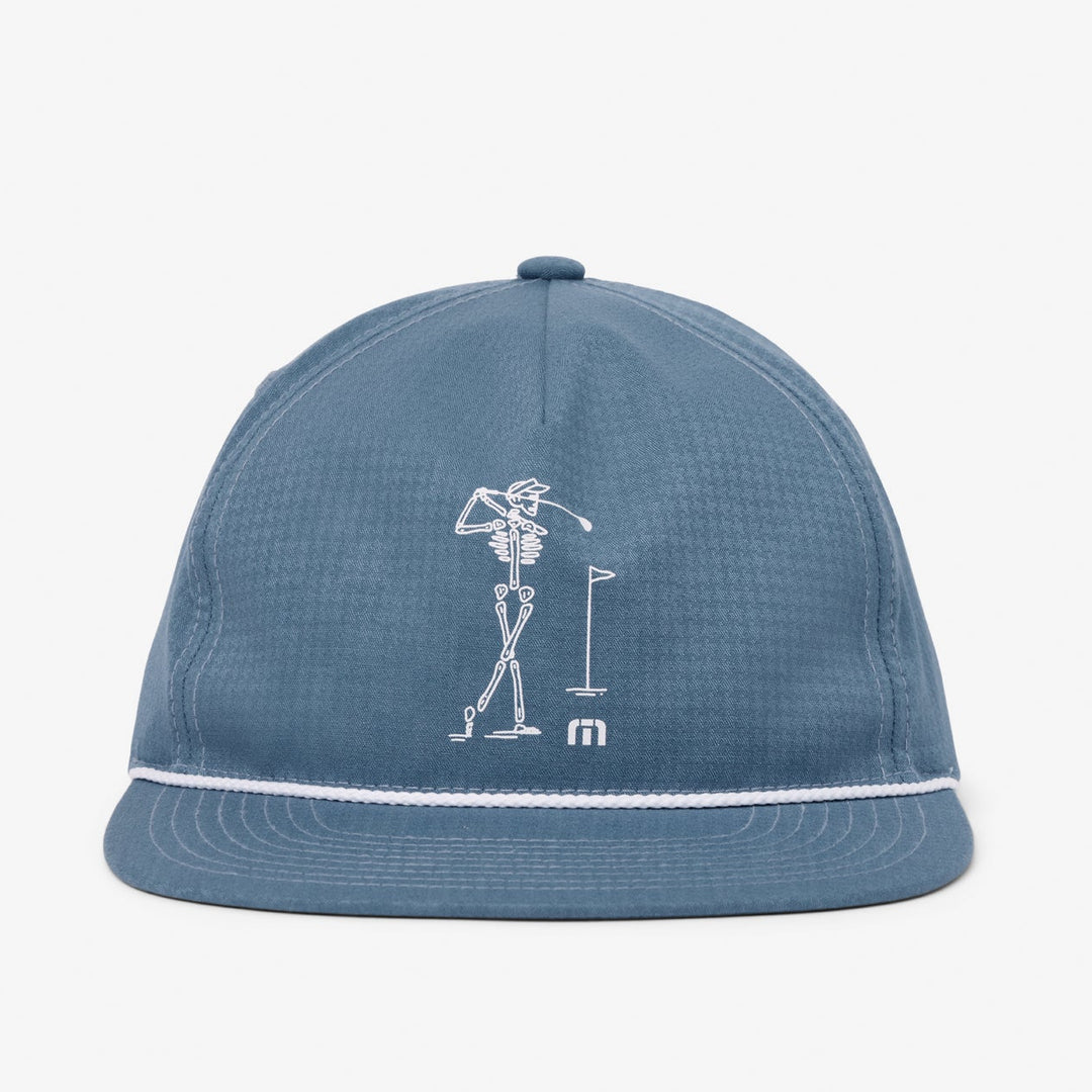 TravisMathew Lost Swing Snapback Hat in blue featuring embroidered skeleton golfer graphic on the front.