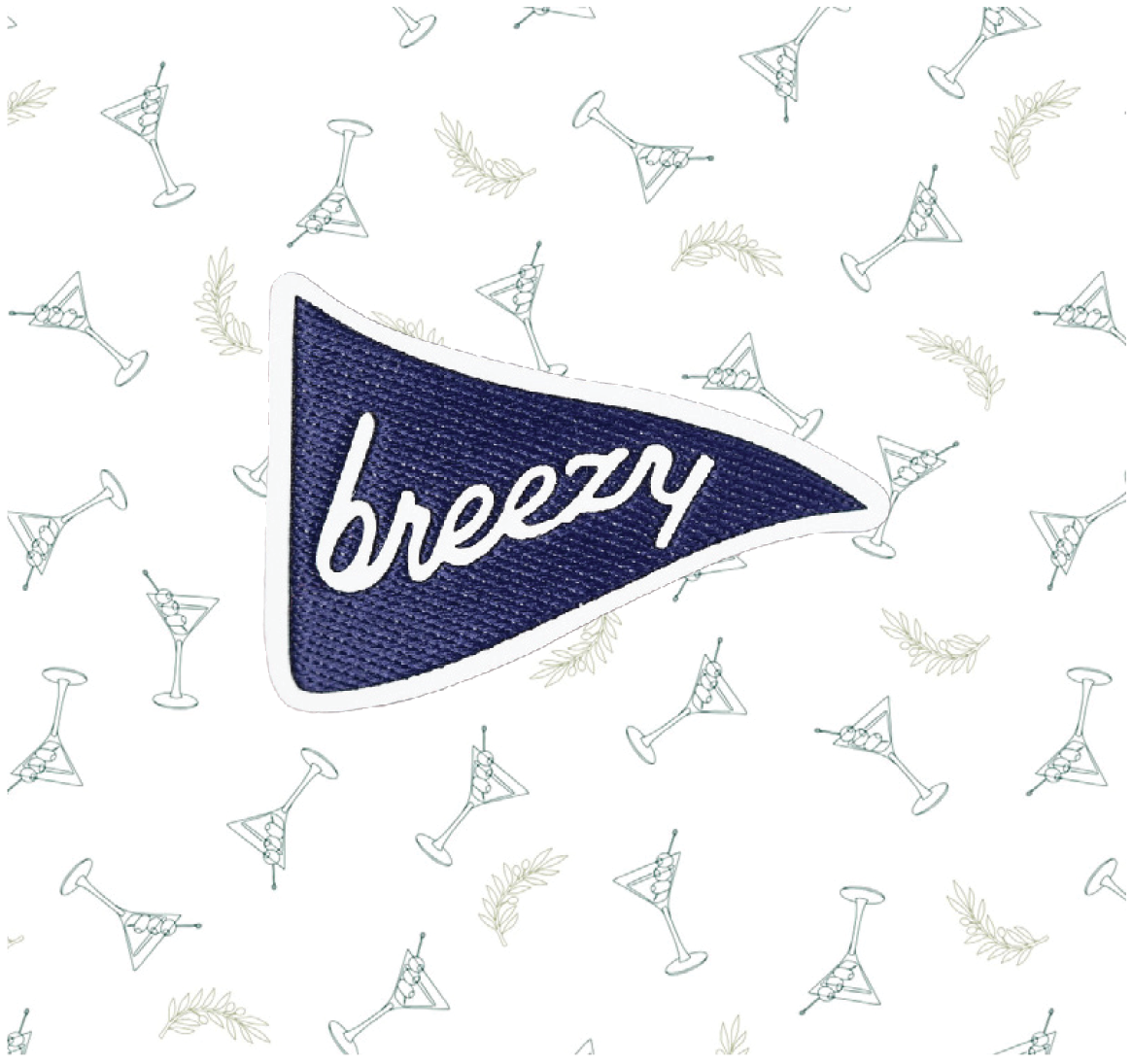 Breezy pennant logo on The Extra Dirty Polo with martini glass and olive branch print detail.