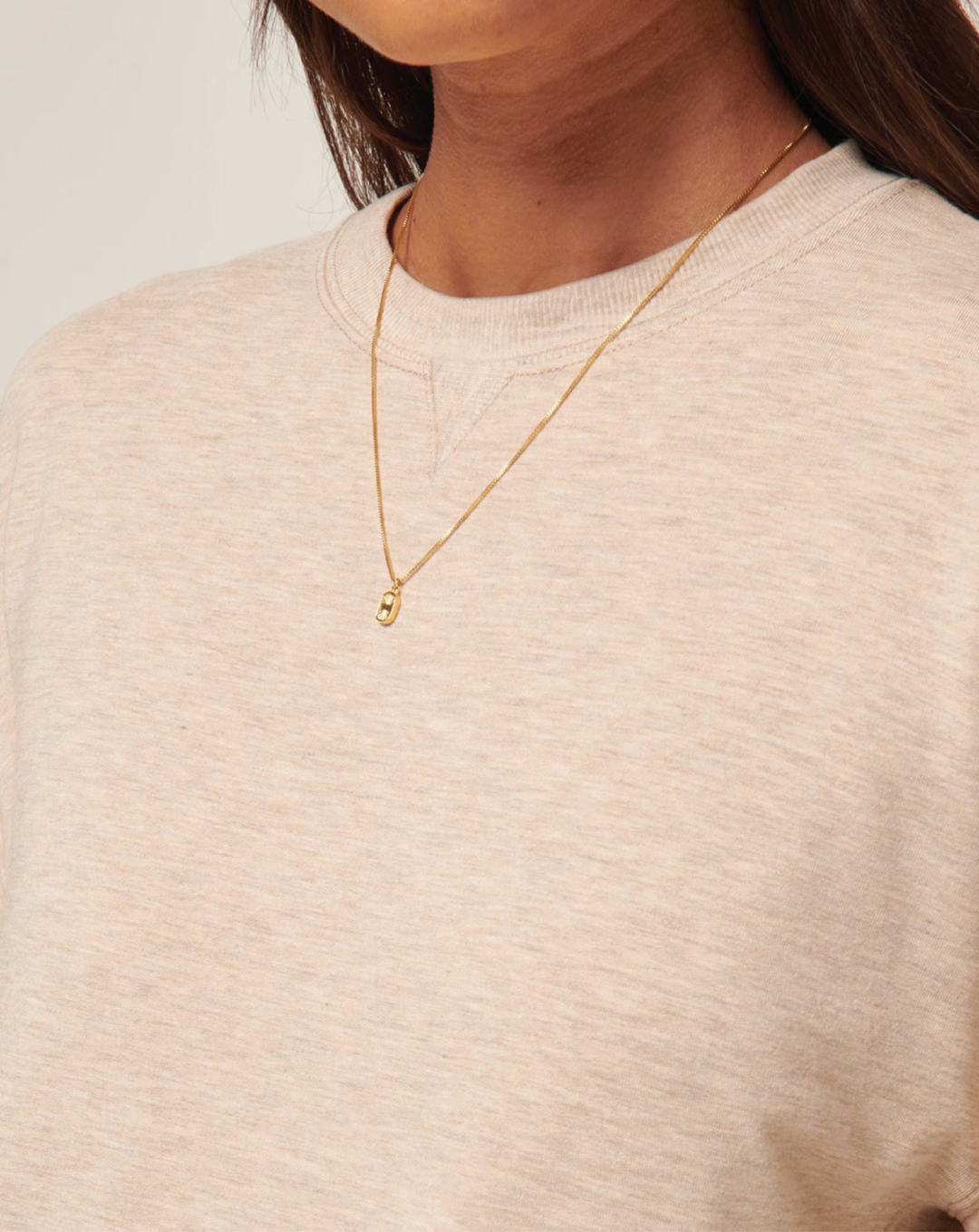 Detail shot of the TravisMathew Cloud Terry Crew showing the soft fabric and crew neckline.