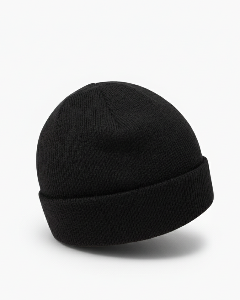 Back view of the TravisMathew Cloud Beanie in black – minimalist rib-knit winter hat with smooth rounded crown, displayed on a clean white background