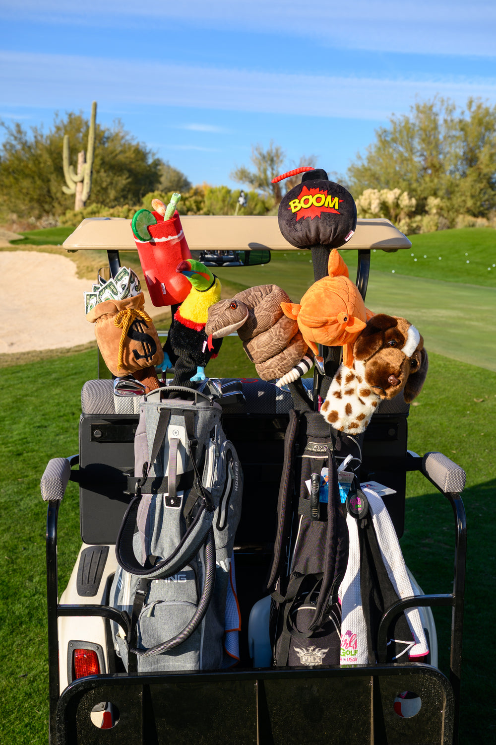 Colorful toucan themed golf driver headcover with bright beak and plush design.