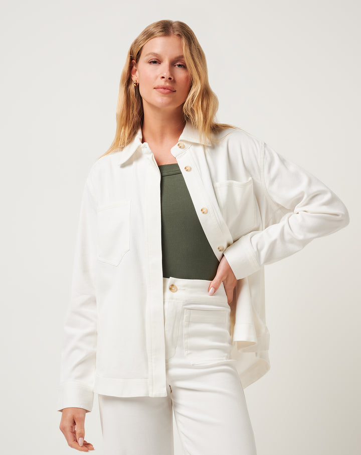 Women’s ivory button down layered over green top