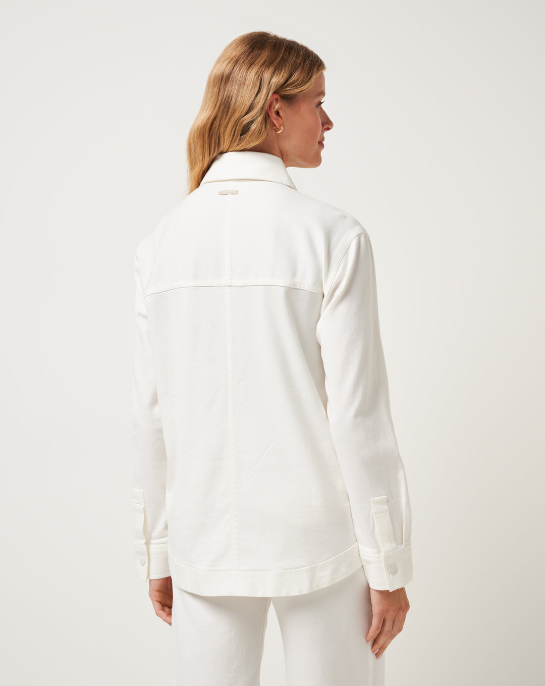 TravisMathew Everyday Button Down back view ivory
