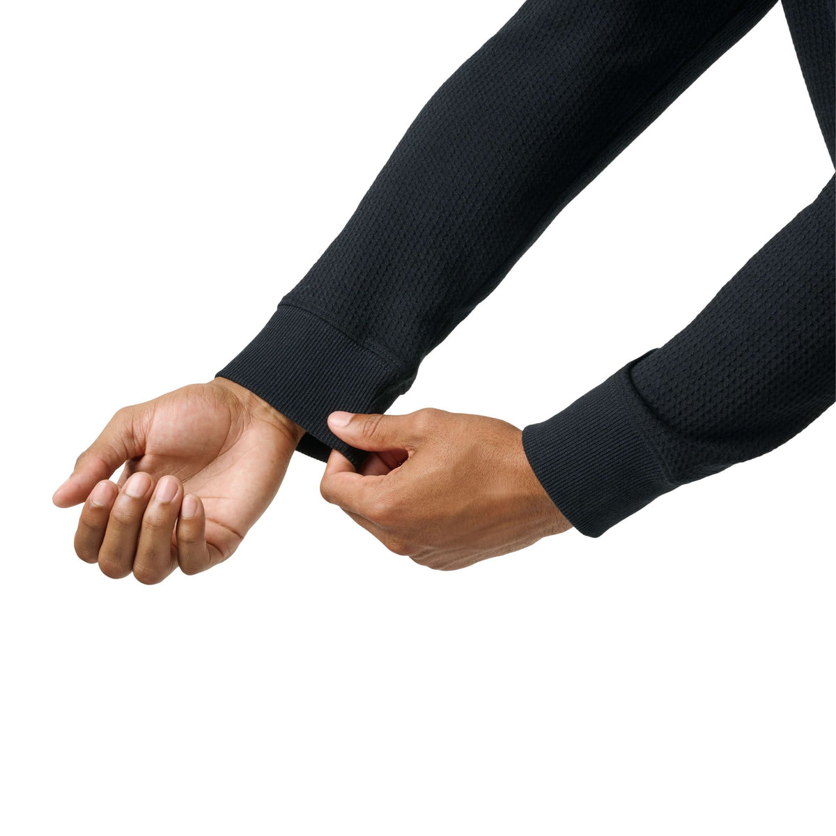 Close-up of men’s black hoodie sleeve and cuff, showing fabric texture and construction detail