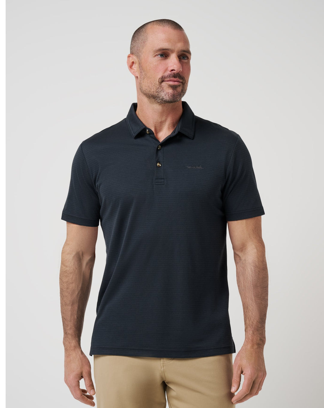 Men’s Zinna 2.0 performance polo in black, front view with modern athletic fit