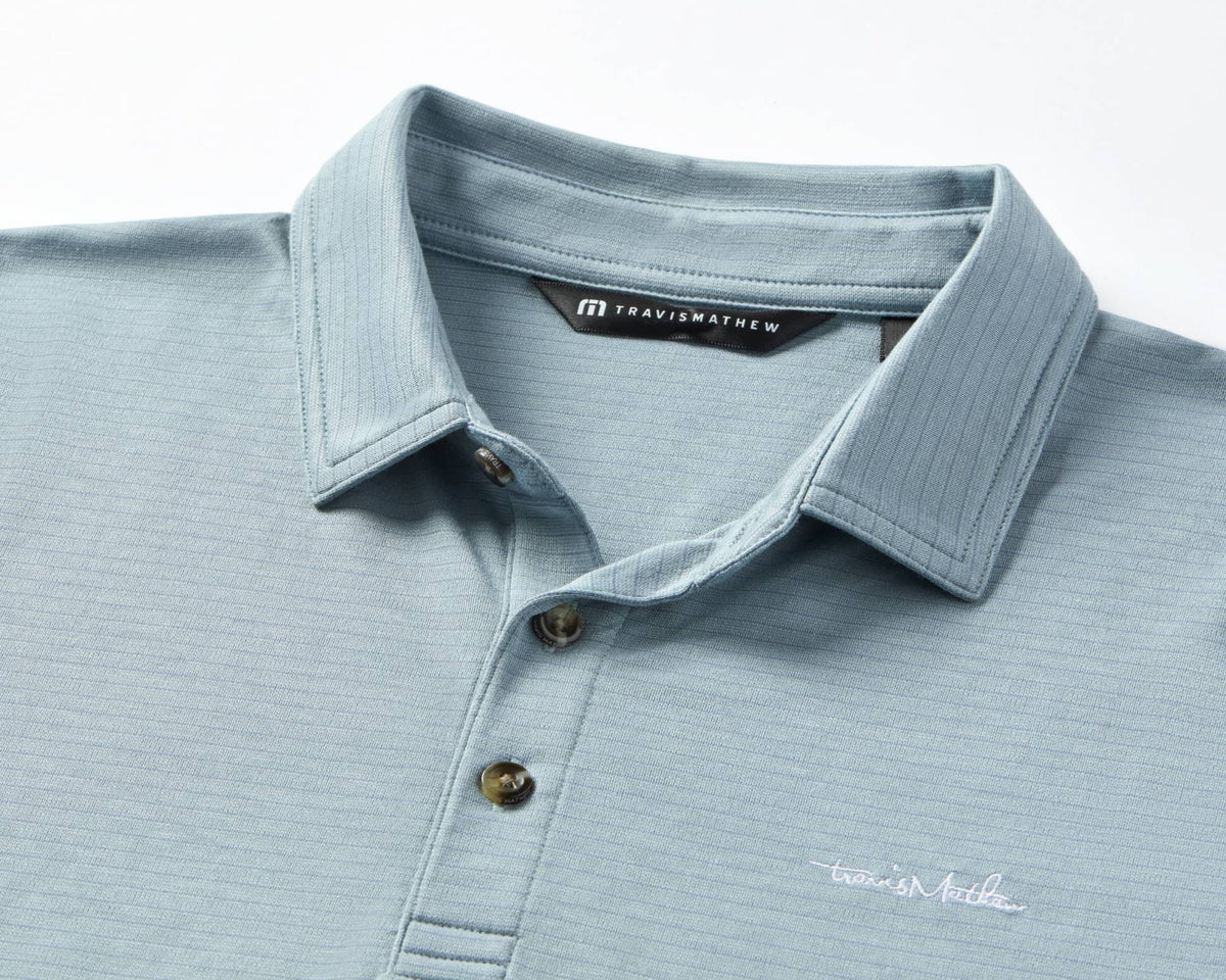 Close-up of Zinna 2.0 polo collar and fabric texture in light blue colourway
