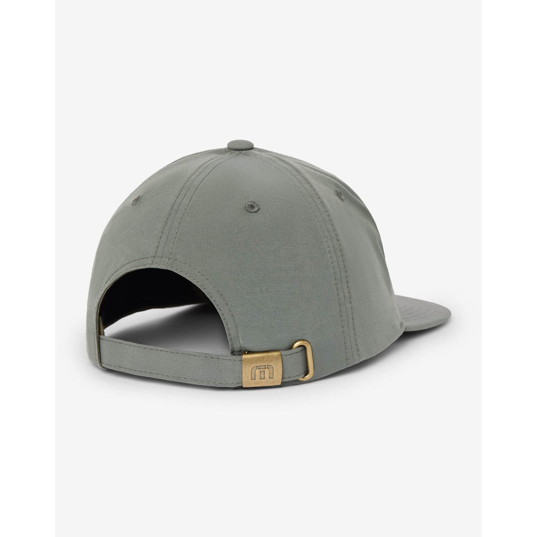 Back view of the TravisMathew Frost This snapback hat in sage green with adjustable strap and brass logo buckle.