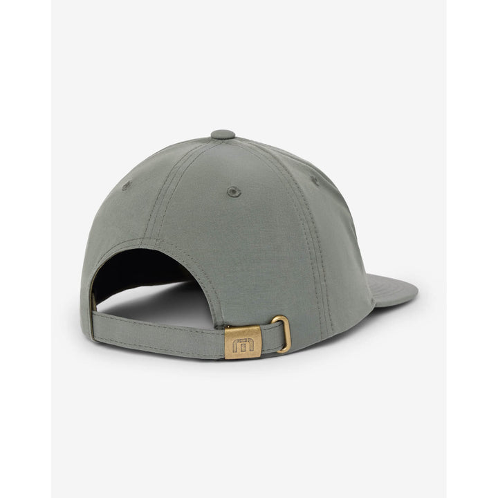 Back view of the TravisMathew Frost This snapback hat in sage green with adjustable strap and brass logo buckle.