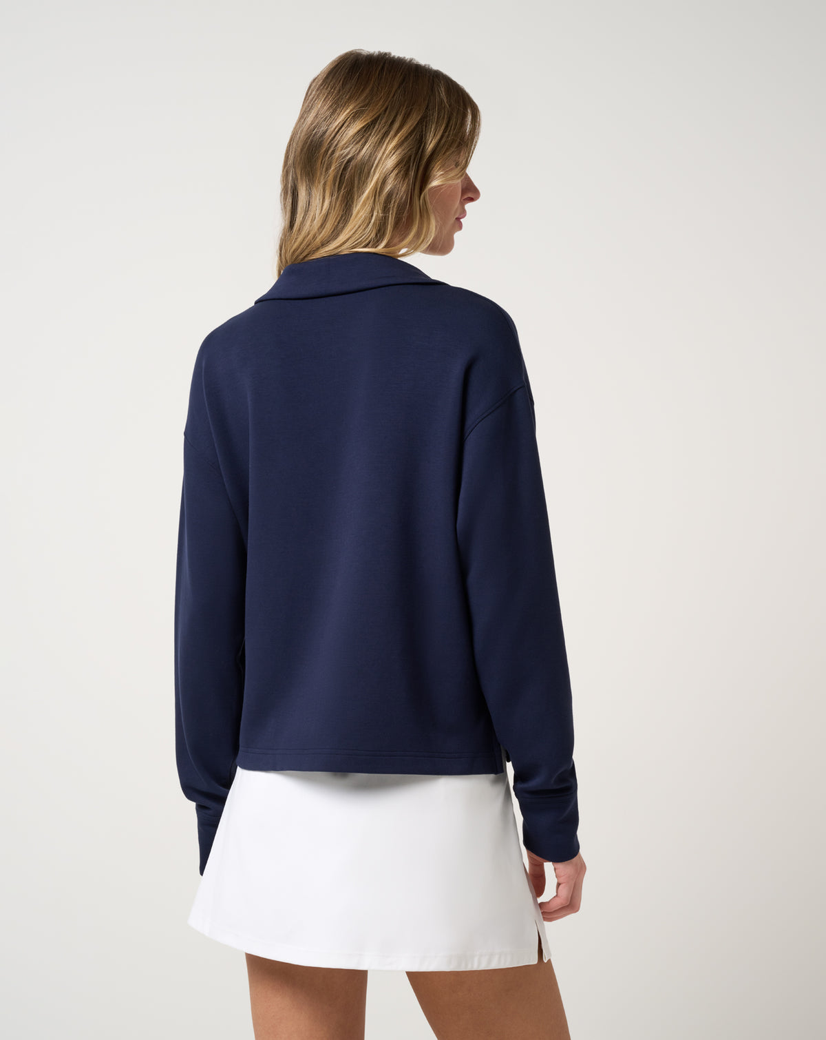 TravisMathew Women's Skyloft Soft V-Neck Pullover navy back view relaxed fit