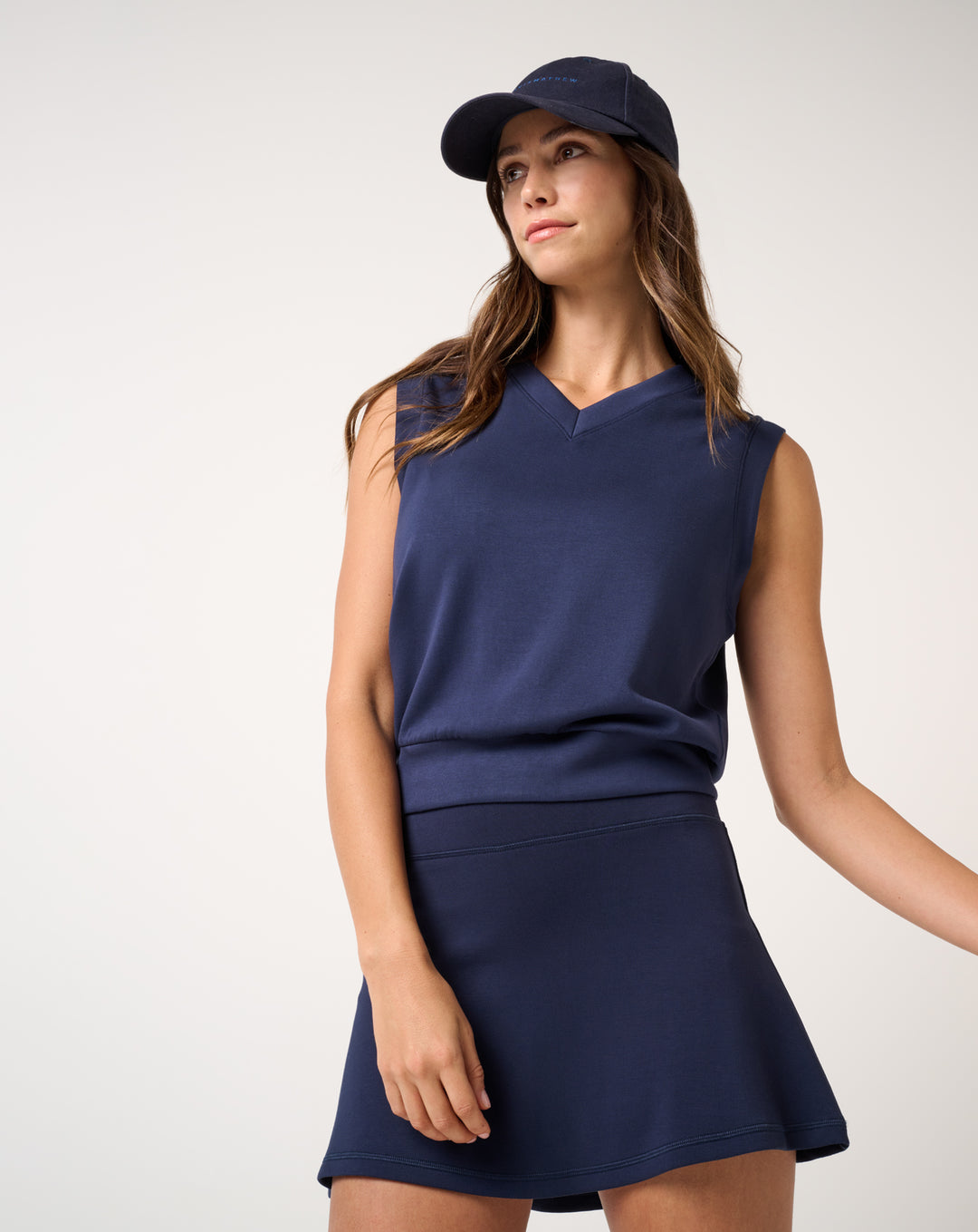 TravisMathew women’s Skyloft Soft Vest in navy blue front view.