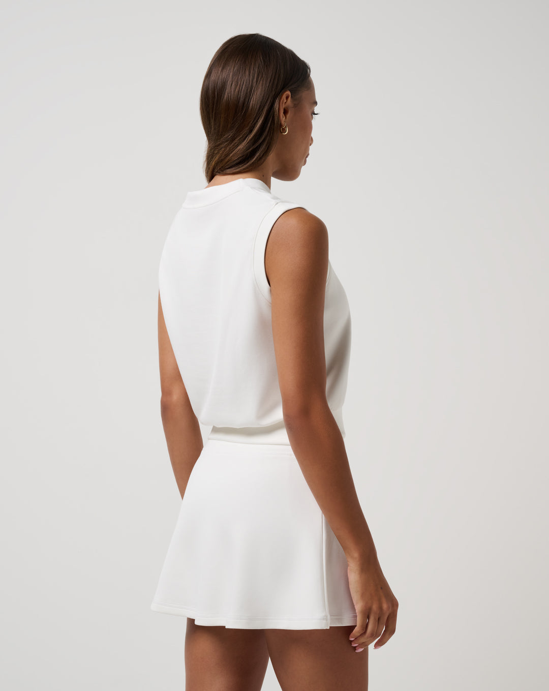Back view of TravisMathew women’s Skyloft Soft Vest in white.