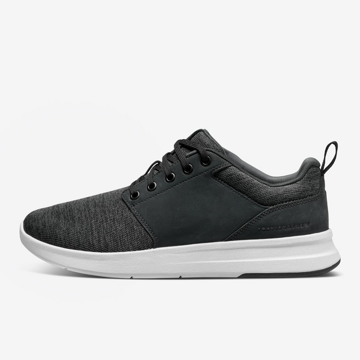 Alternate side view of TravisMathew Daily 3 shoe showing leather details and low-profile design