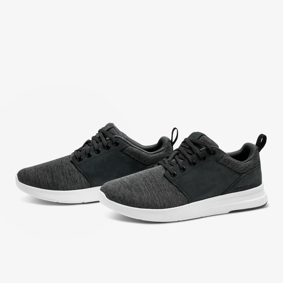 Pair of TravisMathew Daily 3 shoes in angled front view with modern casual silhouette