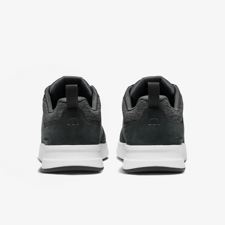 Back view of TravisMathew Daily 3 shoes showing heel pull tab and cushioned midsole