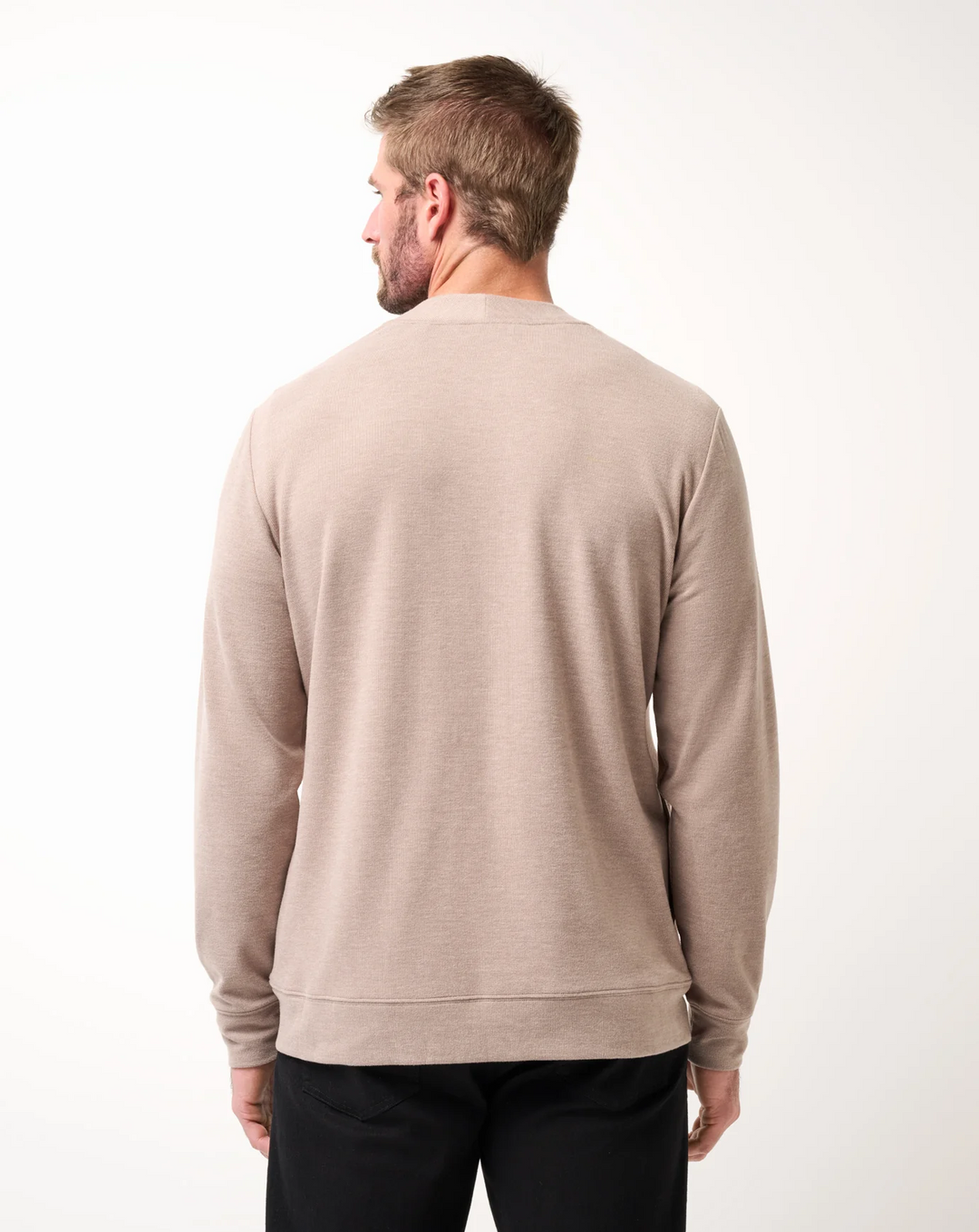 Back view of men’s heather beige cardigan sweater showing clean silhouette and relaxed fit