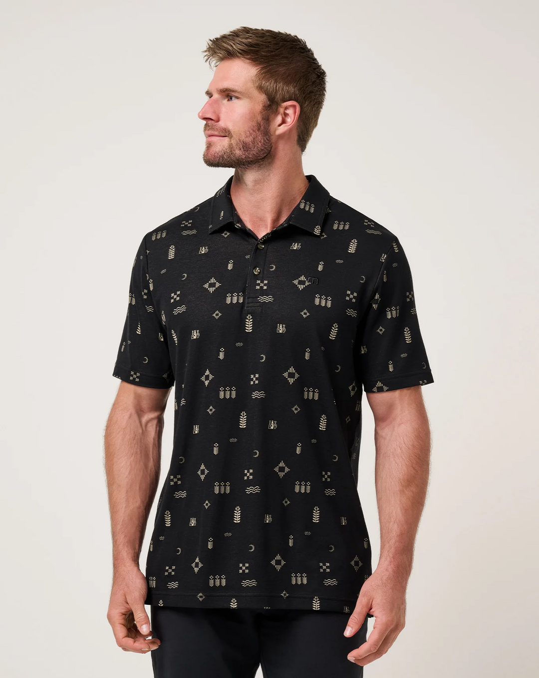 Men’s black Weather Patterns Polo featuring subtle all-over geometric jacquard print, shown from the front on model