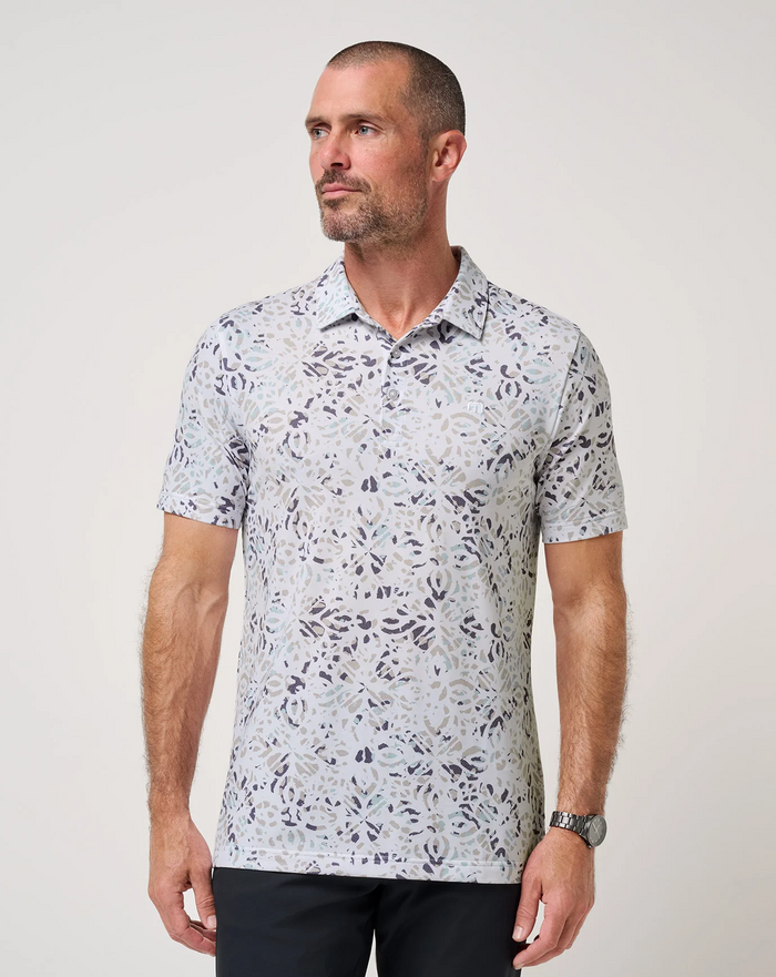 TravisMathew Featherweight Chill Polo with abstract all-over print, front view