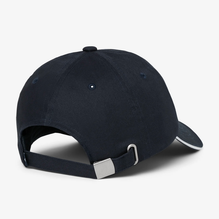 Back view of TravisMathew Social Club navy cap with adjustable strap closure