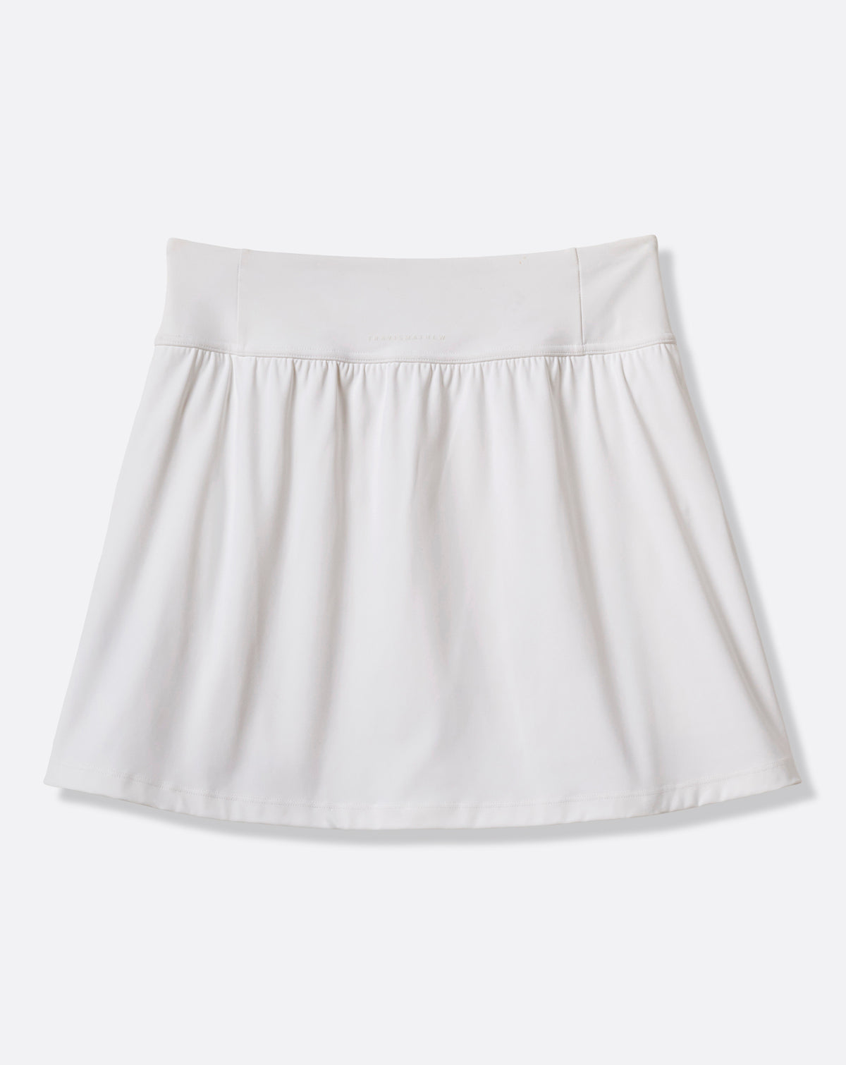 TravisMathew Moveknit Game Set Match Skort in white, front product view