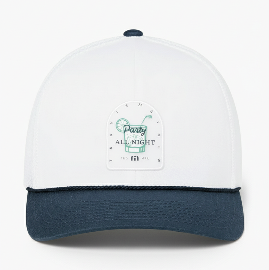 TravisMathew Beer Break Hat, white with navy brim and cocktail graphic patch.