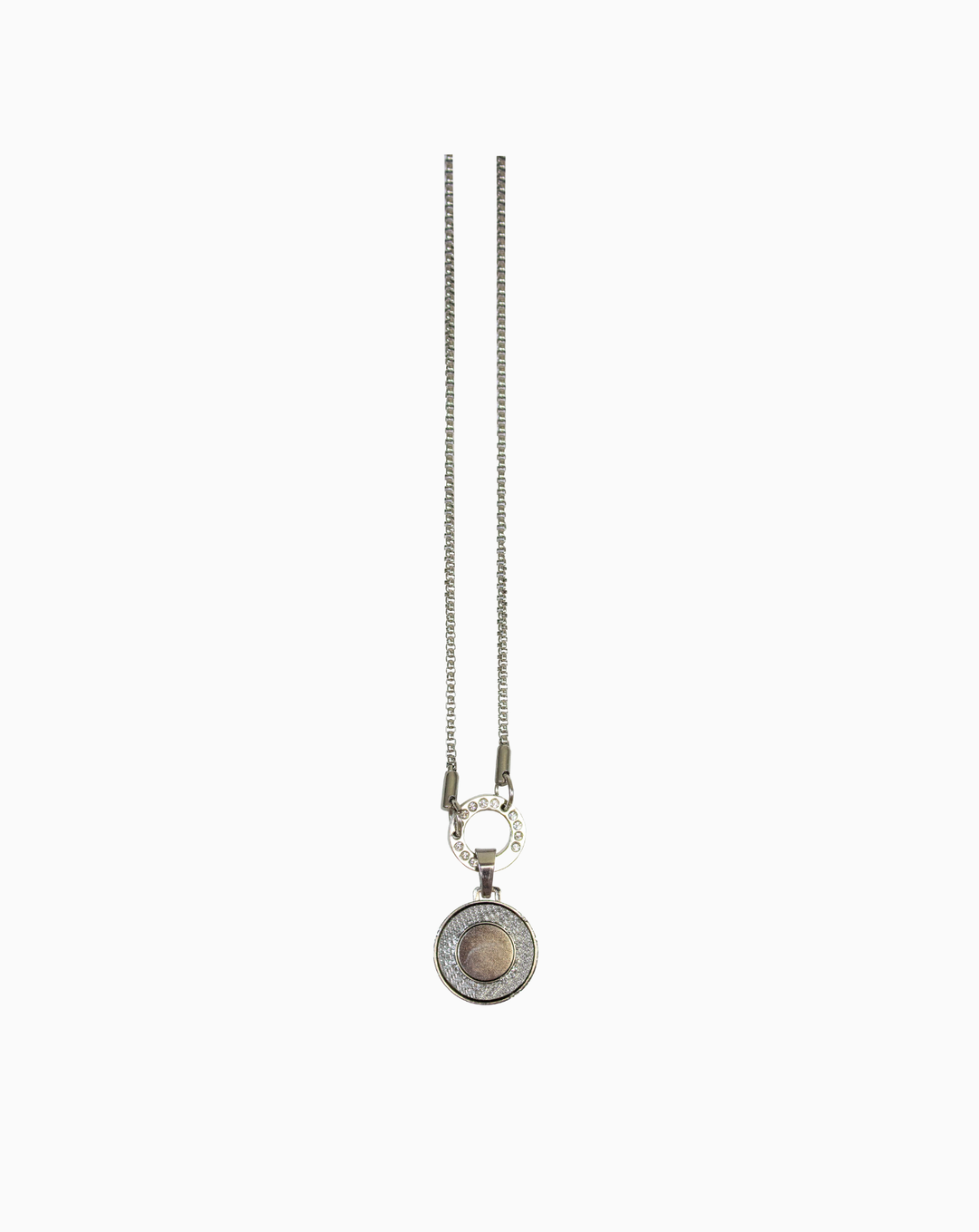 A sleek silver MXM Bling Necklace featuring a long chain and circular magnetic pendant attachment, displayed on a clean white background.