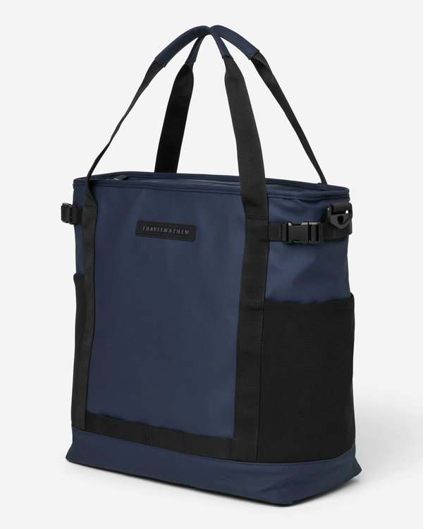 TravisMathew Grab & Go Cooler Bag in Total Eclipse, front angle view showing tote handles, mesh side pocket and side compression buckle